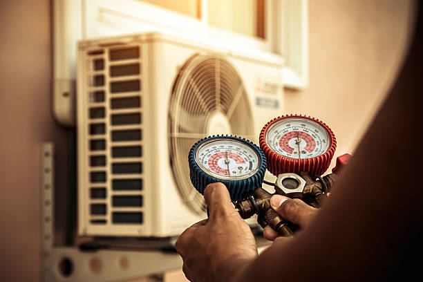 Professional Air Conditioning Service technician working in Keystone, IN